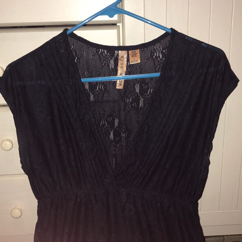 Blue sheer V neck top with cap sleeves.